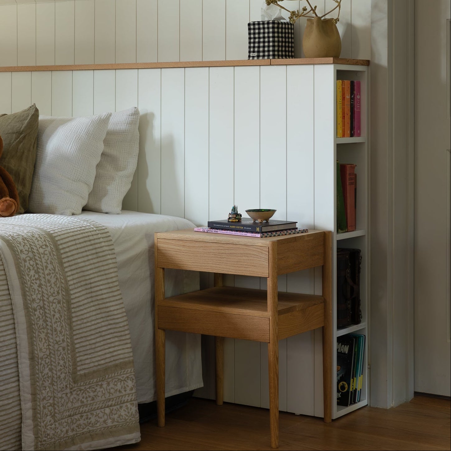 Custom built in headboard by Earl Home Interior Design and white oak bedside table