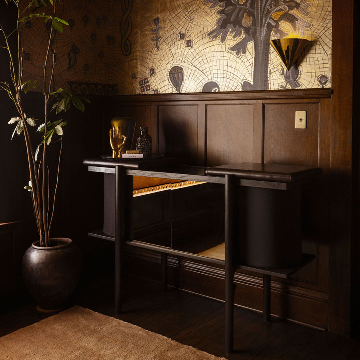 Dark interior design setting with a decorative wall mural and a custom bespoke handmade in los angeles record cabinet. made in america