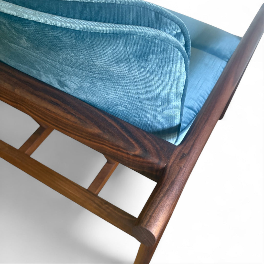Blue velvet micro corduroy upholstered chair with solid wood frame. Available in white oak or walnut, with a custom upholstery. Hand made in Los Angeles California.