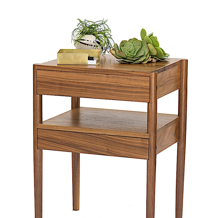 The Earl Home BEDSIDE Table is a solid wood nightstand featuring two open drawers, a minimalist design, and a natural finish. Custom sizing ensures it fits your space perfectly.