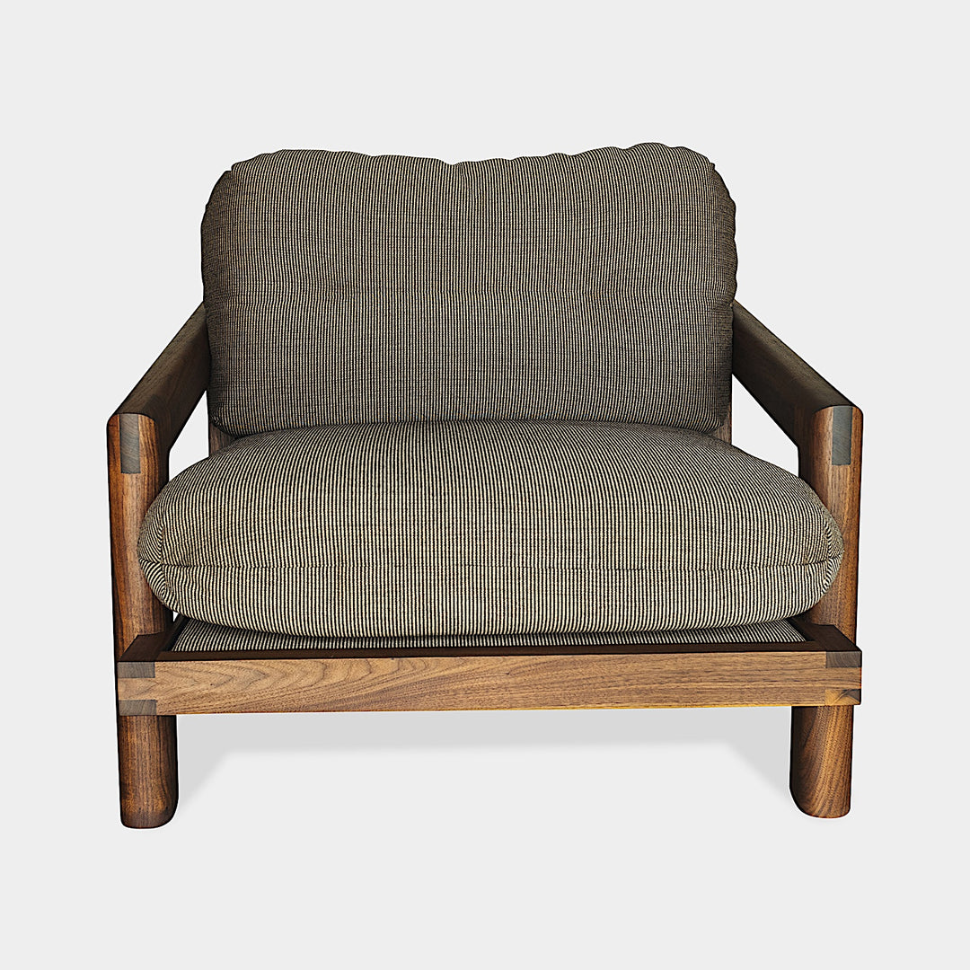 The Earl Home Walnut TAMBU Lounge Chair boasts olive leather upholstery, a sturdy walnut frame, and cushioned seat and backrest.