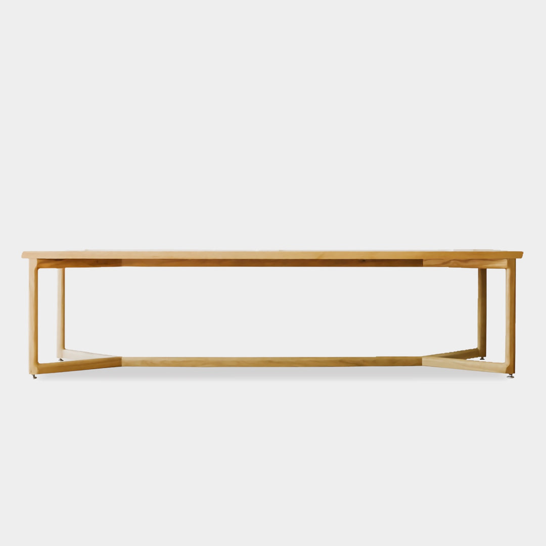 The WOLF Bench by Earl Home is a long, handcrafted piece with a light finish and angular metal legs that highlight the beauty of solid wood.