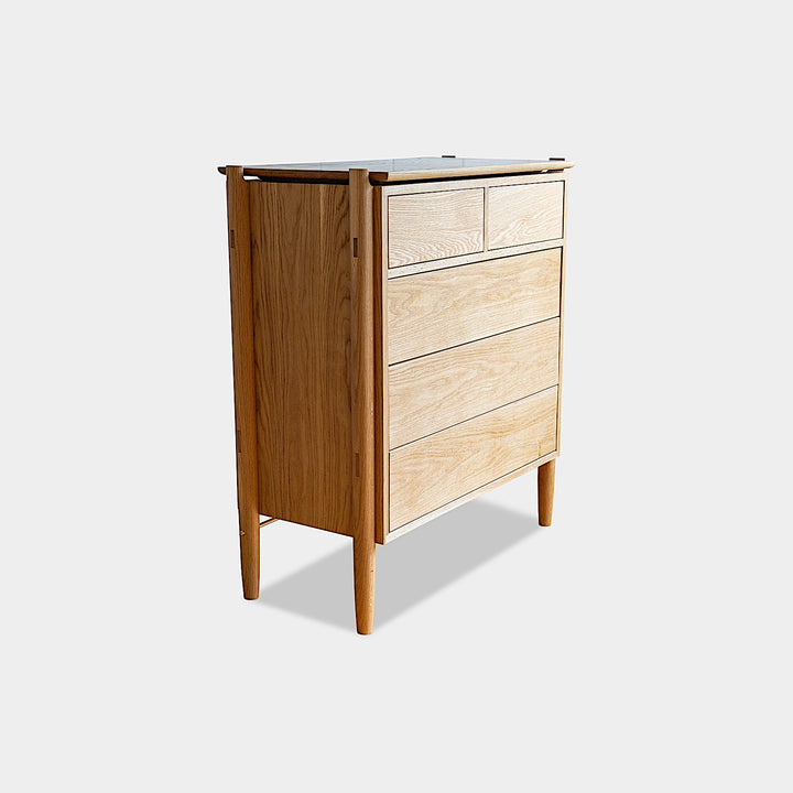 The KABOT Sideboard (High) by Earl Home is a custom-made walnut dresser with two small top drawers and three larger bottom drawers, showcased against a plain background.