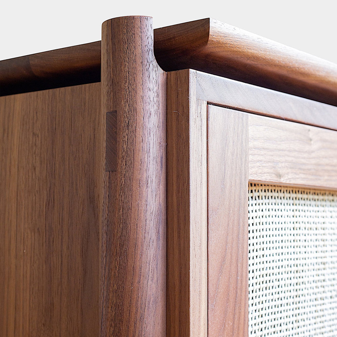 The KABOT Sideboard (High) by Earl Home is a custom-made walnut dresser with two small top drawers and three larger bottom drawers, showcased against a plain background.