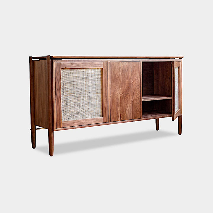 The KABOT Sideboard (Low) by Earl Home is a wooden mid-century modern dresser, featuring two woven panels and slender legs, exemplifying heritage quality design.