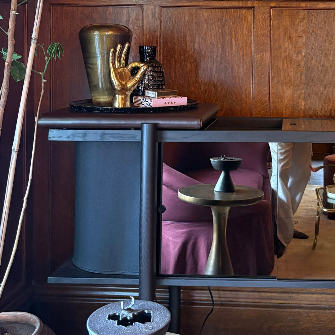 Record Cabinet including Decorative interior design with a mosaic wall, wooden paneling, and purple chairs. Made in Los Angeles, California