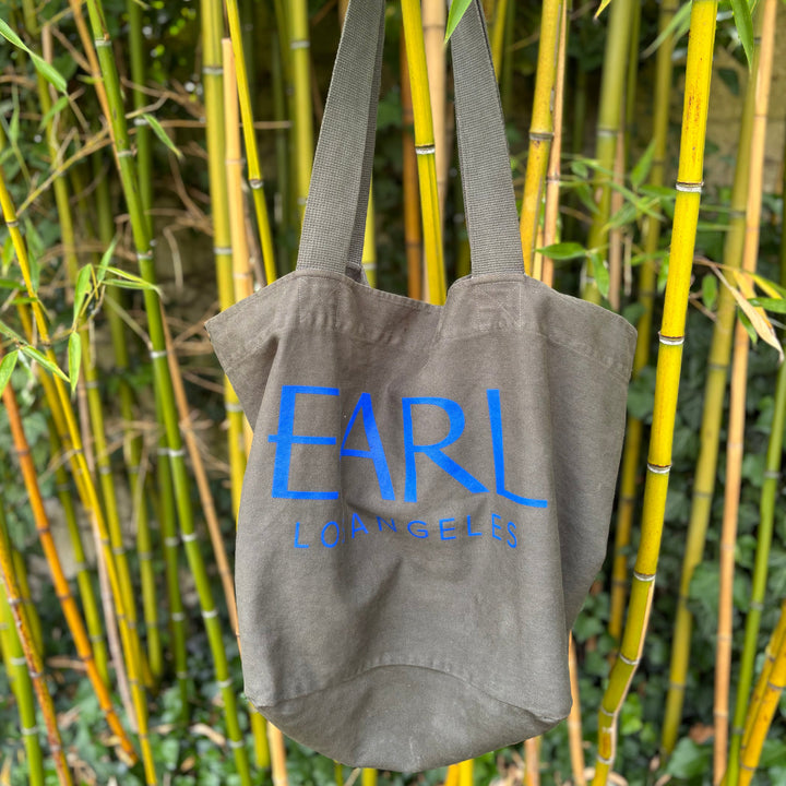 Army hunter green large canvas tote with royal blue font EARL Los Angeles