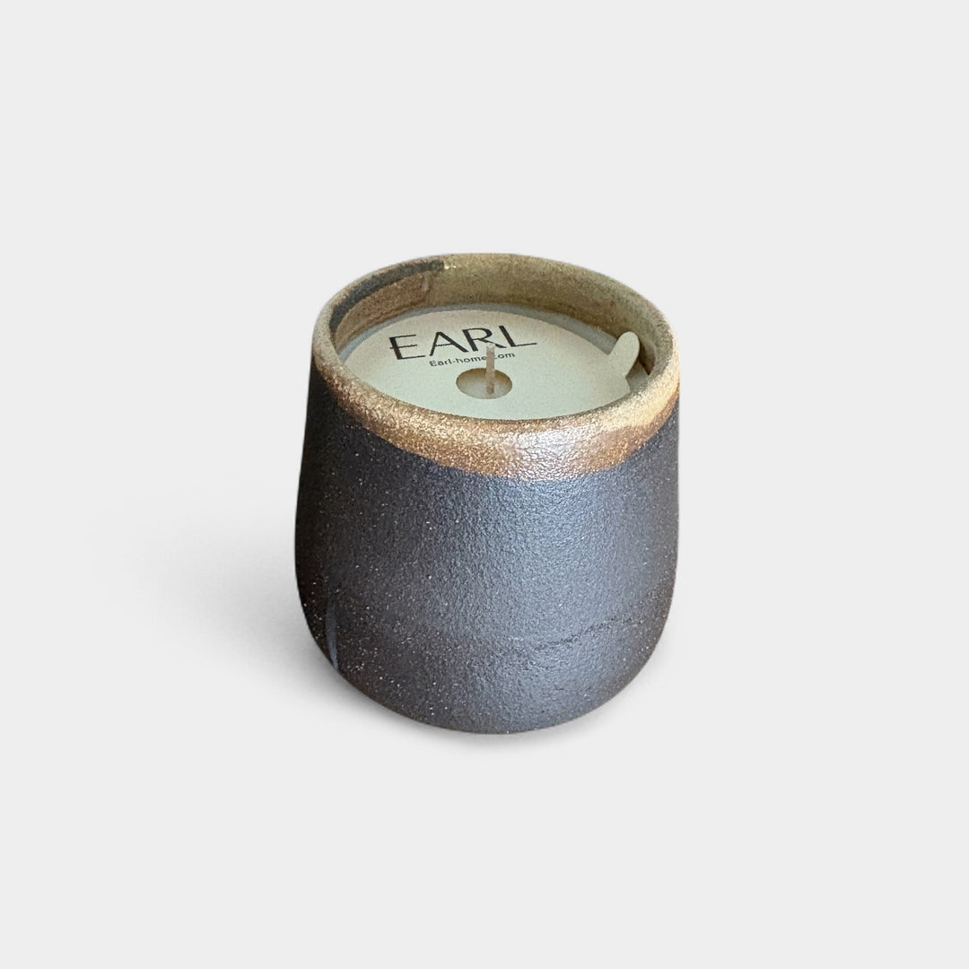 Hand thrown ceramic candle vessel with soy hand poured candle. Scent - basil vetiver cedar