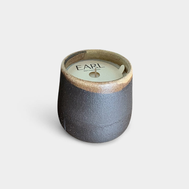 Hand thrown ceramic candle vessel with soy hand poured candle. Scent - basil vetiver cedar