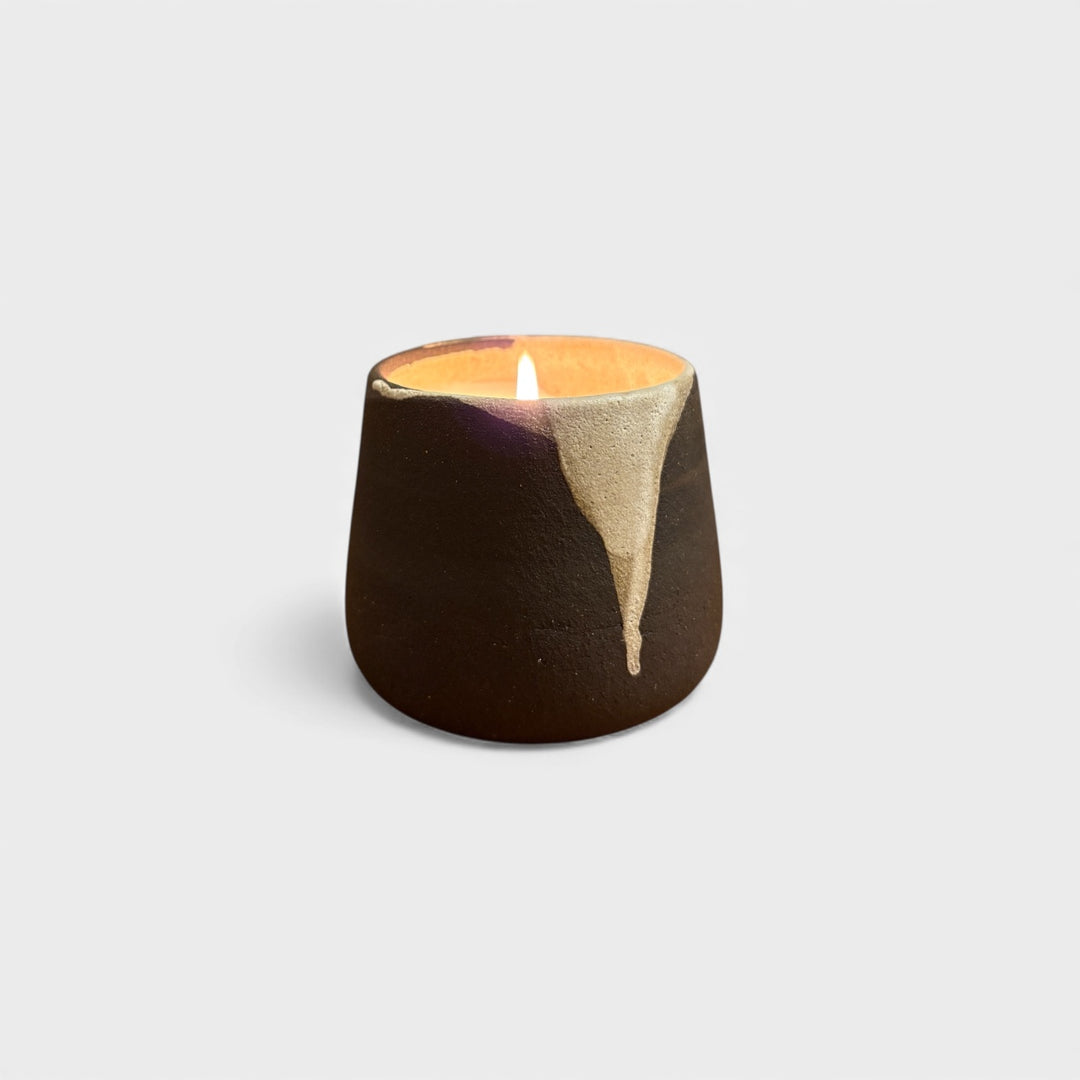 Hand thrown ceramic charcoal clay candle vessel with soy hand poured candle. Scent - basil vetiver cedar 