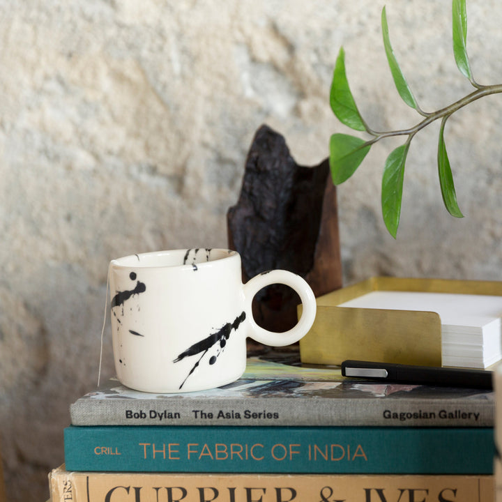 EARL Ceramic hand thrown circle mug, with black splattered glaze.