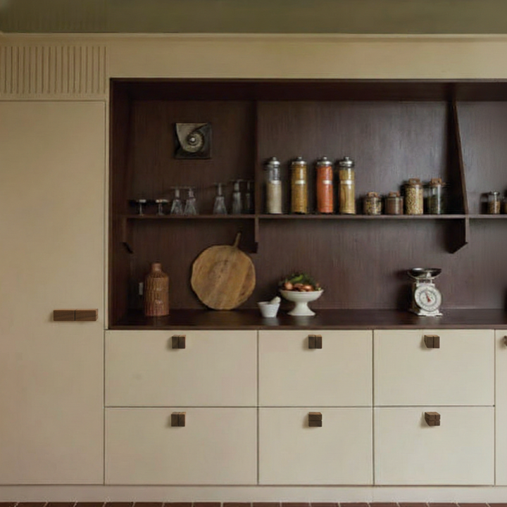 Wooden custom cabinet knob made in walnut available in white oak or ebonized oak in modern cream warm kitchen