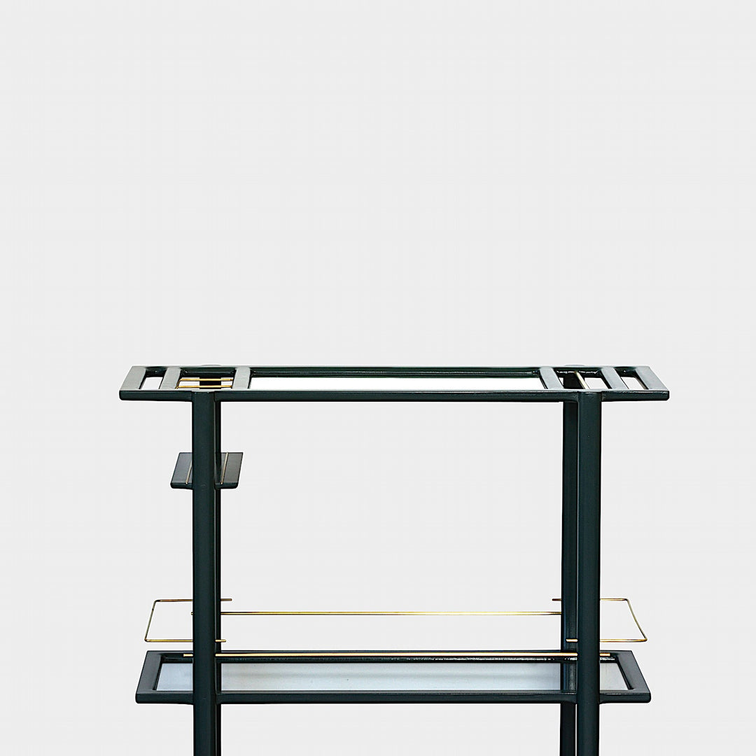 A minimalist wine rack with a dark frame and gold accents, featuring two rows for wine bottles and a top shelf.