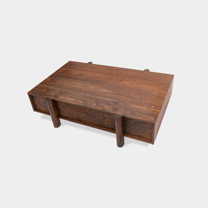 This LAPILO Coffee Table from Earl Home Designed by Chris Earl is solid wood constructed with hand cut joinery. With drawers on both the front and back, it’s not only visually appealing but also incredibly practical, making it an ideal choice for a game table or a multi-functional living room space. This table comes in walnut, maple, white oak, ebonized oak and is custom made in any size or shape desired.