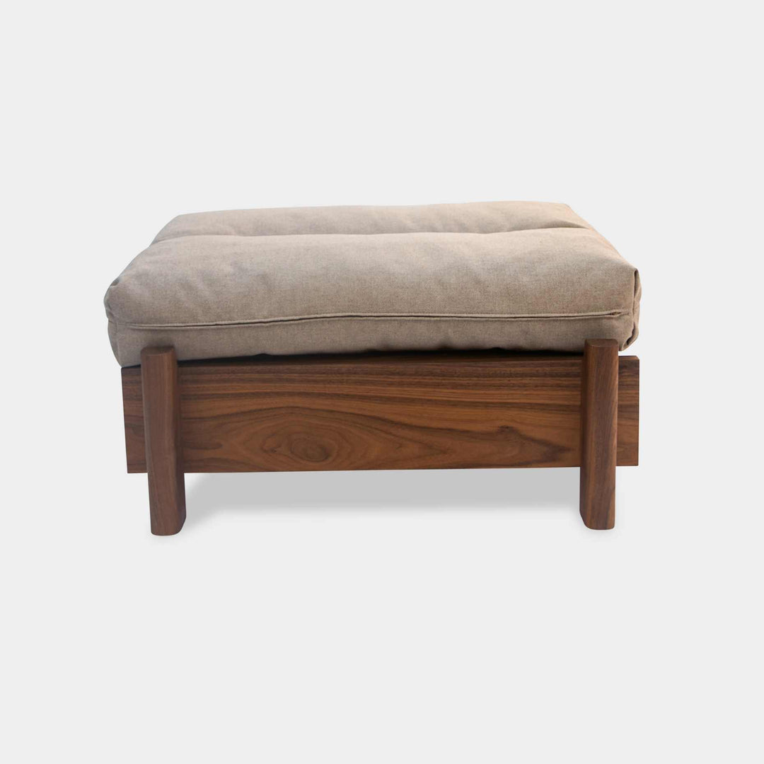 This EARL handmade dog bed has a solid wood base with a hidden drawer, and a custom detachable cushion upholstered in Sunbrella Blend Sand. We offer various fabrics and customers own fabric is encouraged as well. The base can be made in walnut, white oak, or ebonized oak and custom sizing is also available.