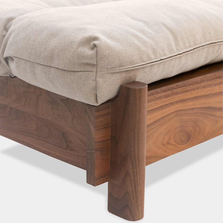 This EARL handmade dog bed has a solid wood base with a hidden drawer, and a custom detachable cushion upholstered in Sunbrella Blend Sand. We offer various fabrics and customers own fabric is encouraged as well. The base can be made in walnut, white oak, or ebonized oak and custom sizing is also available.