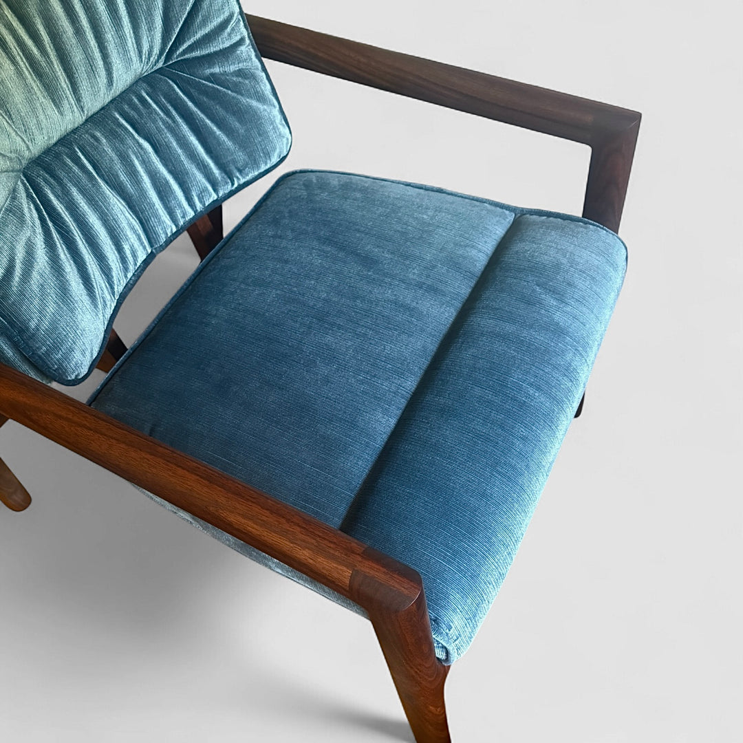 Blue velvet micro corduroy upholstered chair with solid wood frame. Available in white oak or walnut, with a custom upholstery. Hand made in Los Angeles California.