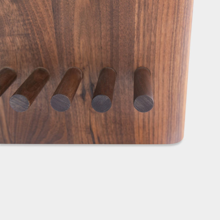The sandstone top coffee table, featuring a refined double bullnose edge, showcases the stone’s natural beauty while adding a soft, sculpted touch. 
Supporting this stunning top is a sleek and sophisticated solid walnut base, meticulously crafted for both durability and style. 