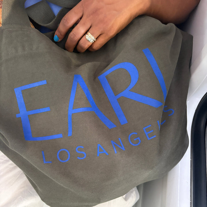 Army hunter green large canvas tote with royal blue font EARL Los Angeles