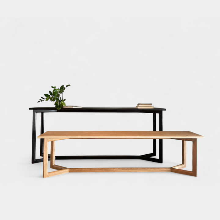 Black ebonized oak mid century modern console table and bench with two lamps and interior designer decorative items. Perfect entry way table.