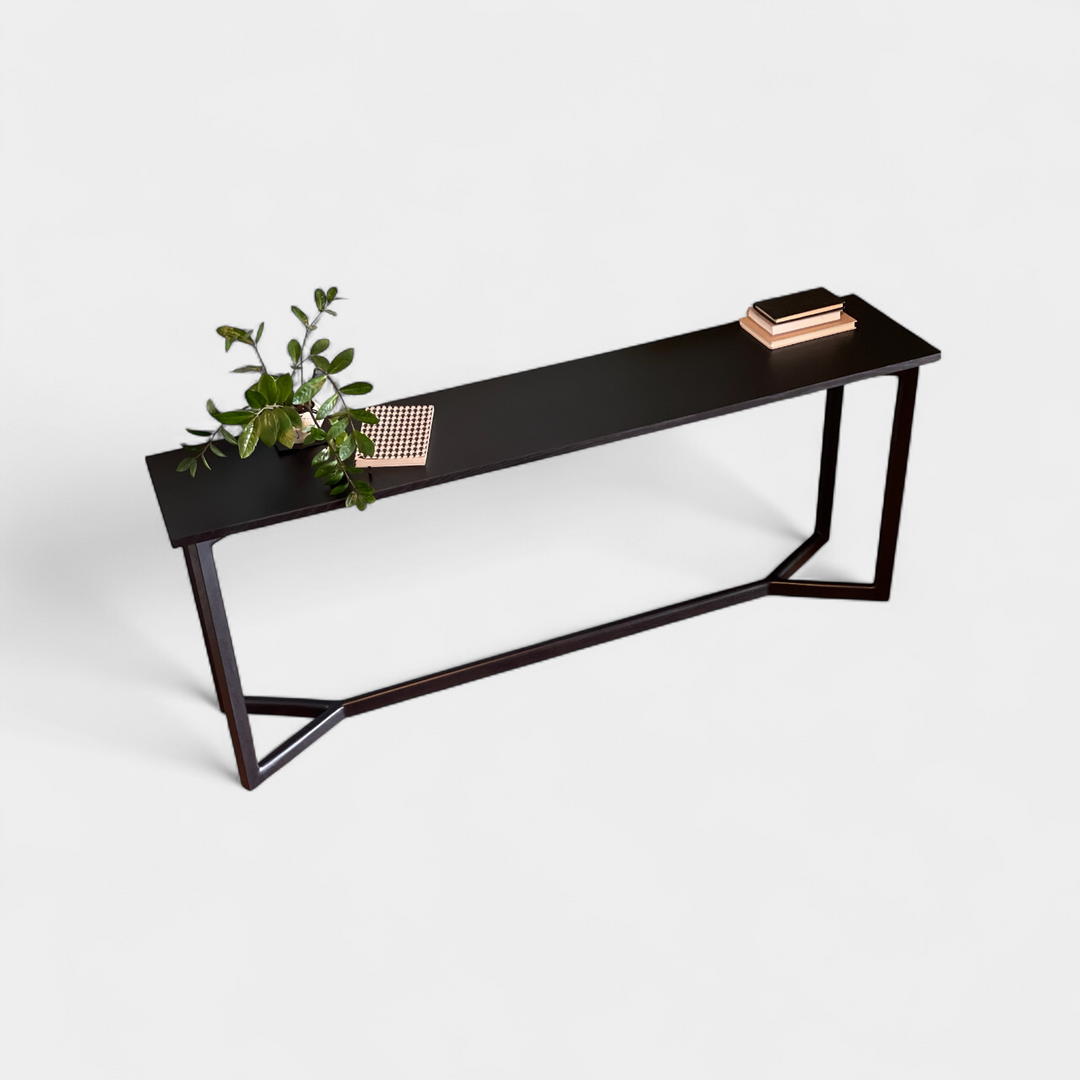 Black ebonized oak mid century modern console table with two lamps and interior designer decorative items. Perfect entry way table.