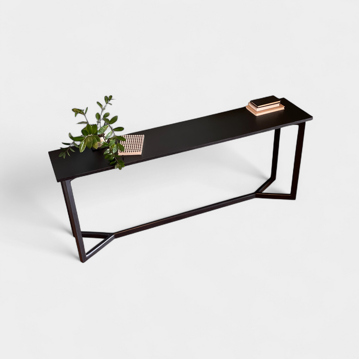 Black ebonized oak mid century modern console table with two lamps and interior designer decorative items. Perfect entry way table.