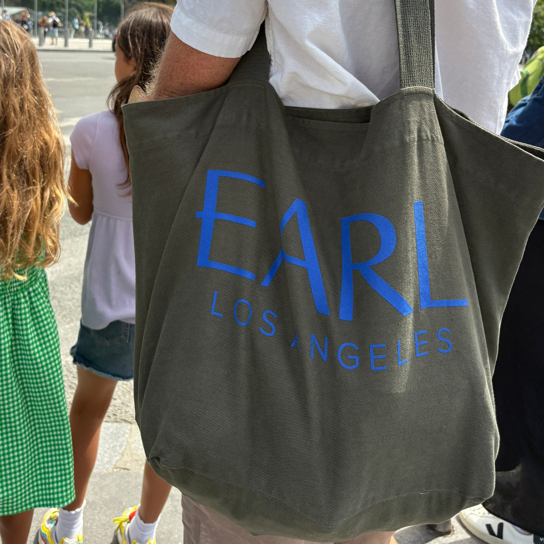 Army hunter green large canvas tote with royal blue font EARL Los Angeles