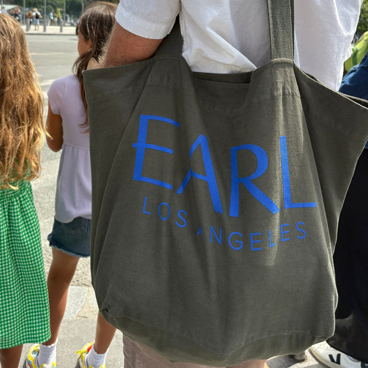 Army hunter green large canvas tote with royal blue font EARL Los Angeles