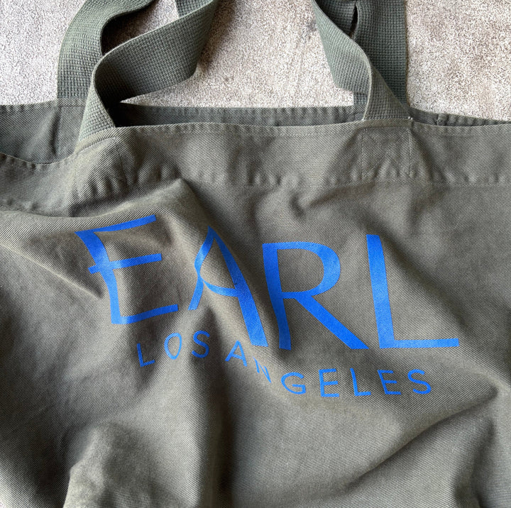 Army hunter green large canvas tote with royal blue font EARL Los Angeles
