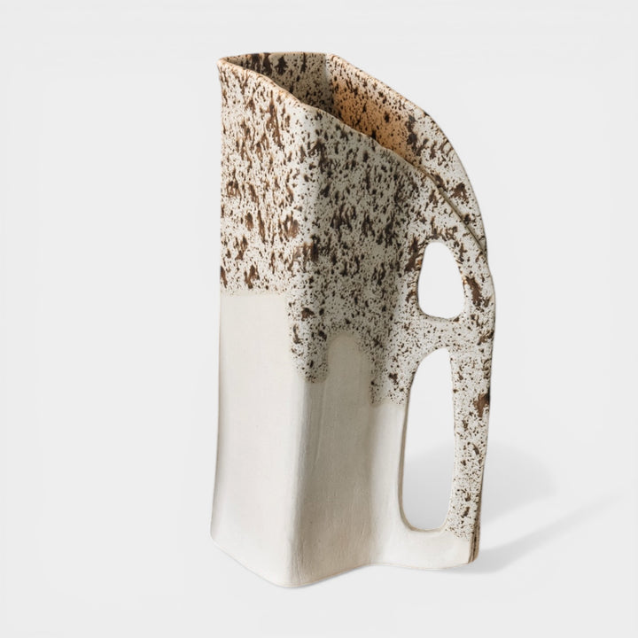 Square shaped pitcher in bmix ivory clay with a brown speckle glaze on top. Hand sculpted from slab rolled clay in Los Angeles, california. Made in America 
