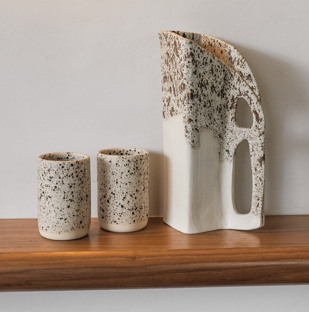 Square shaped pitcher in bmix ivory clay with a brown speckle glaze on top. Hand sculpted from slab rolled clay in Los Angeles, california. Made in America 