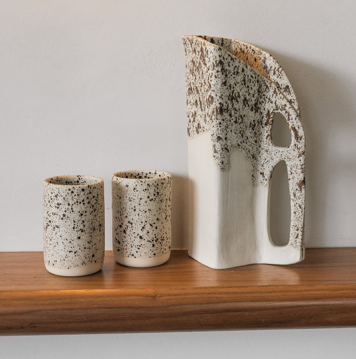 Square shaped pitcher in bmix ivory clay with a brown speckle glaze on top. Hand sculpted from slab rolled clay in Los Angeles, california. Made in America 