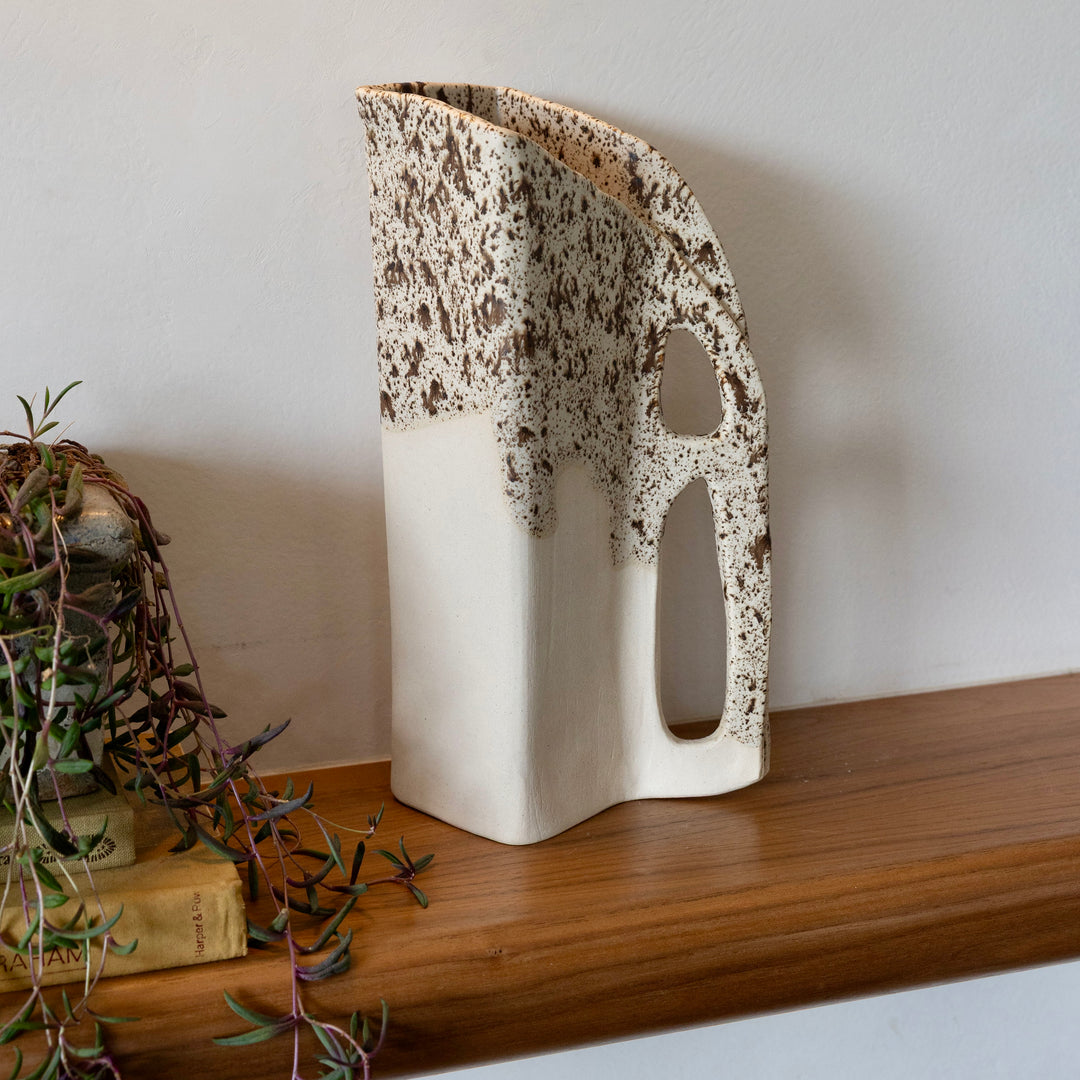 Square shaped pitcher in bmix ivory clay with a brown speckle glaze on top. Hand sculpted from slab rolled clay in Los Angeles, california. Made in America 
