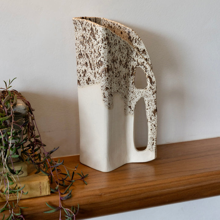 Square shaped pitcher in bmix ivory clay with a brown speckle glaze on top. Hand sculpted from slab rolled clay in Los Angeles, california. Made in America 