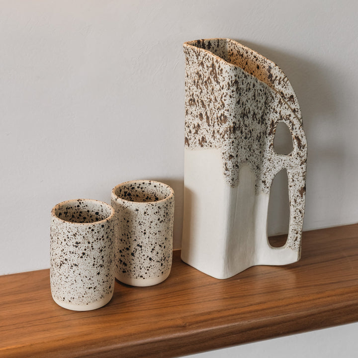 Square shaped pitcher in bmix ivory clay with a brown speckle glaze on top. Hand sculpted from slab rolled clay in Los Angeles, california. Made in America 