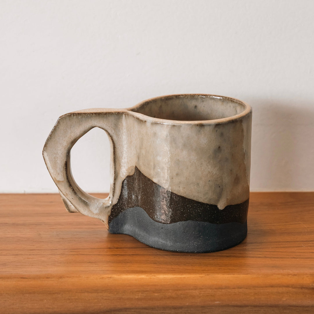 Hand sculpted Ceramic mug with two-tone design. Slab rolled hand built in Los Angeles, California. Made in America.