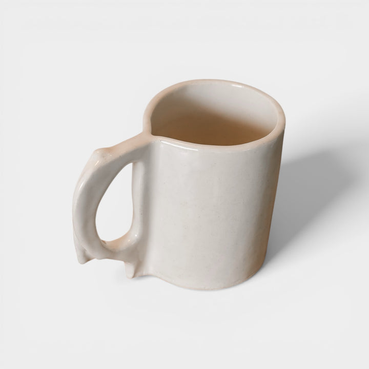 Hand sculpted Ceramic mug with ivory gloss glaze. Slab rolled hand built in Los Angeles, California. Made in America.