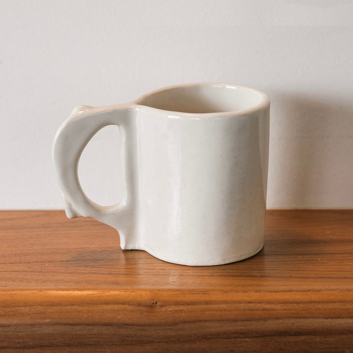 Hand sculpted Ceramic mug with two-tone design. Slab rolled hand built in Los Angeles, California. Made in America.