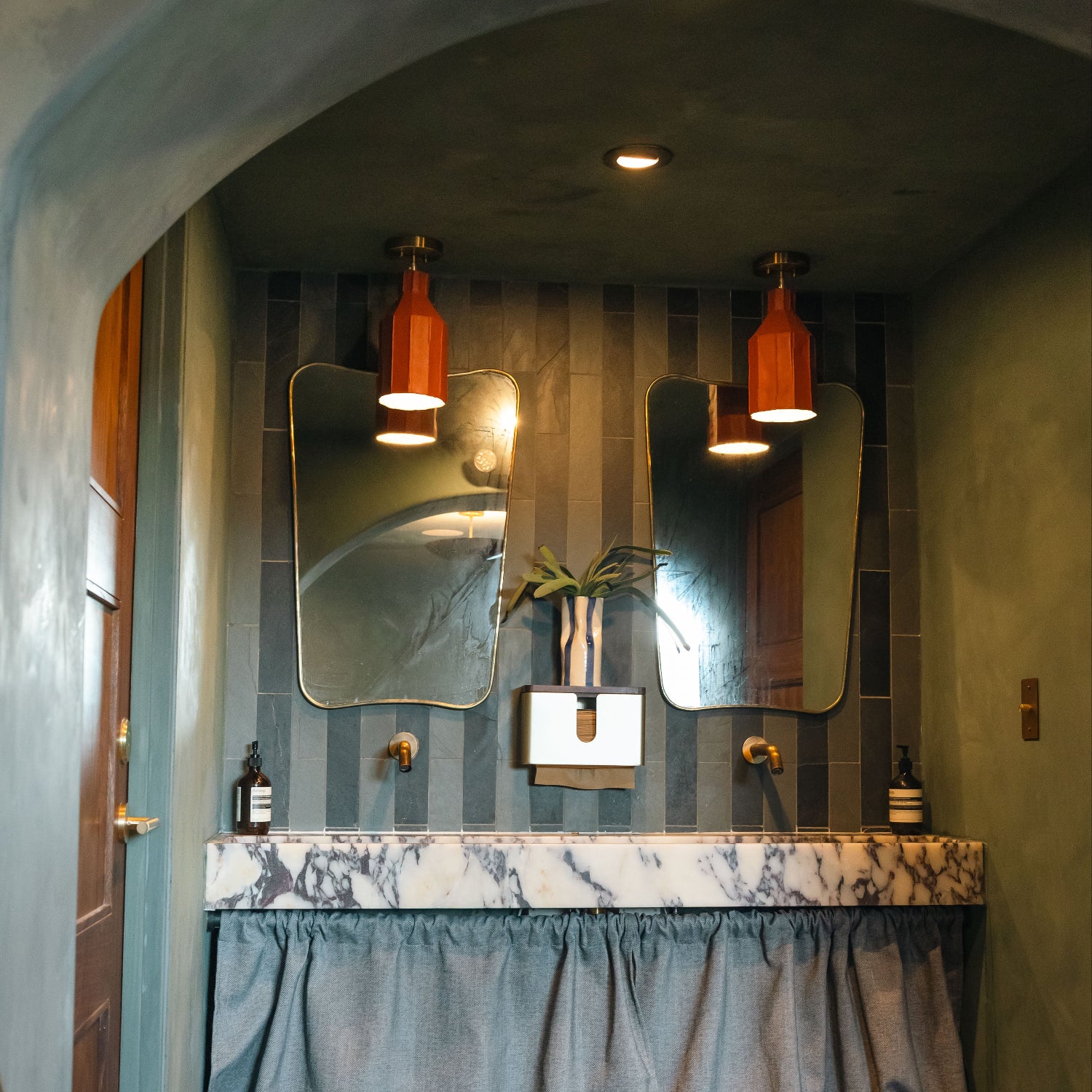 EARL Interior design for Reunion and Company wine and coffee shop. Limewash walls marble sink for bathroom decor.