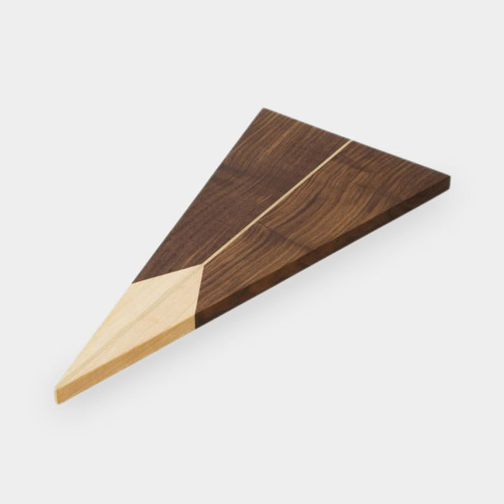 The TRIANGLE Cheese Board by Earl Home is a stylish centerpiece with a triangular design. It is solid walnut and maple featuring a brass spline. Perfect for your cheeseboard or charcuterie spread.